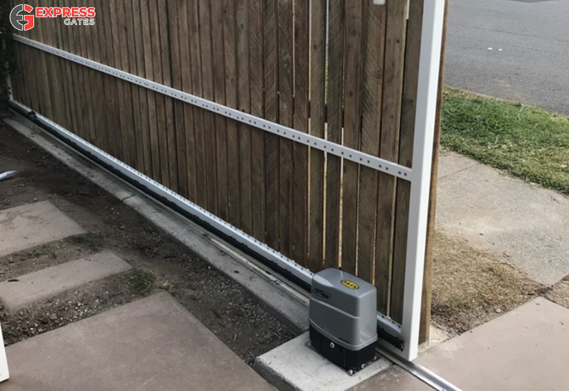 Sliding gate motor mounted on aluminium track